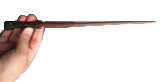picture of a magic wand held in a hand